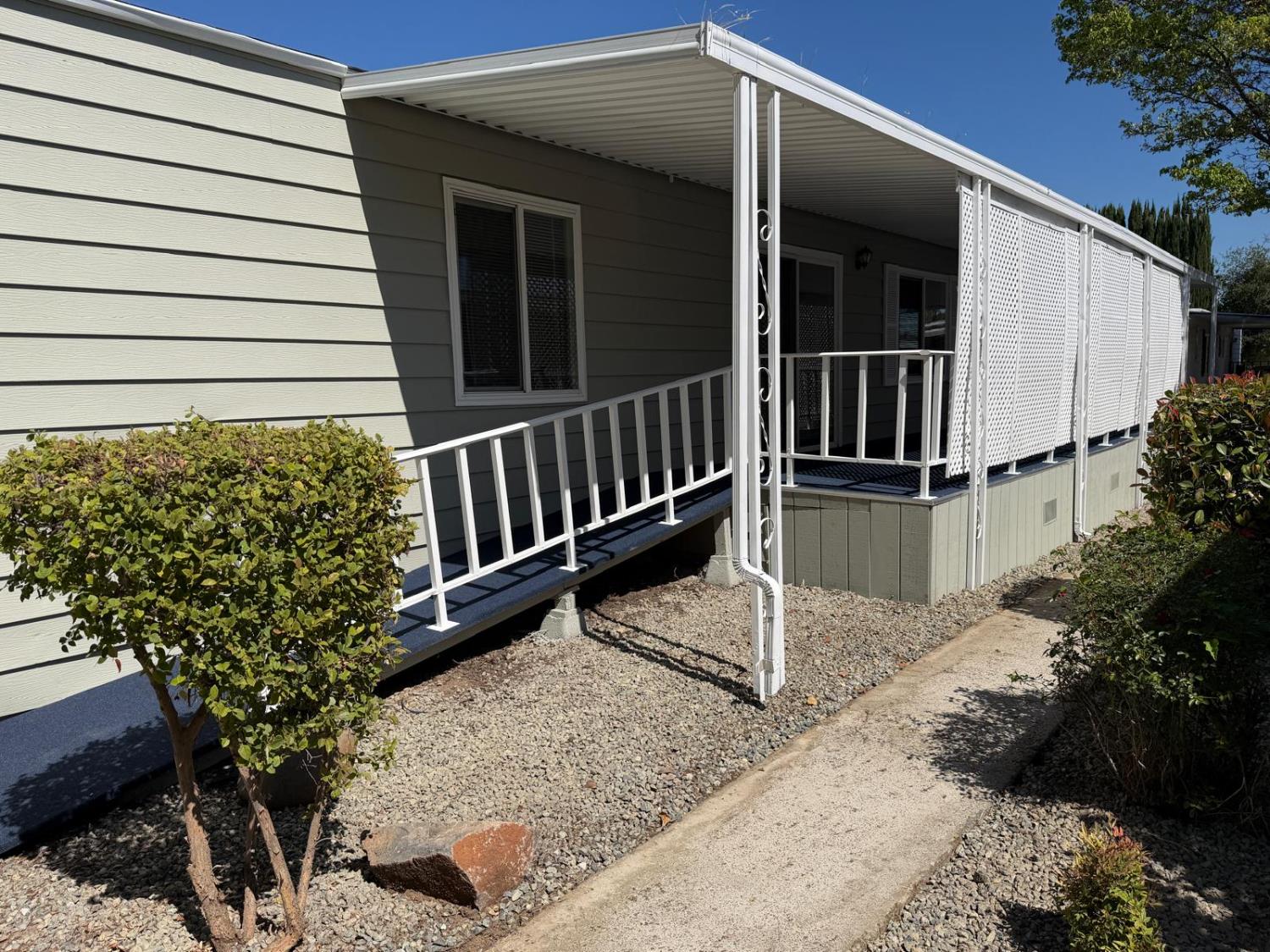 3 Rimma Way Roseville, CA 95661 - Photo 35 of 38 a view of a house with a yard and flower plants