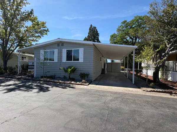 a view of a house with a patio