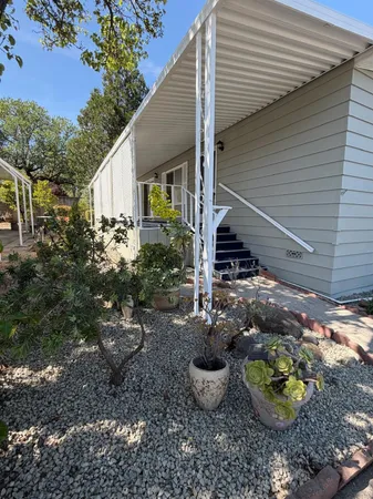 a view of a backyard with garden