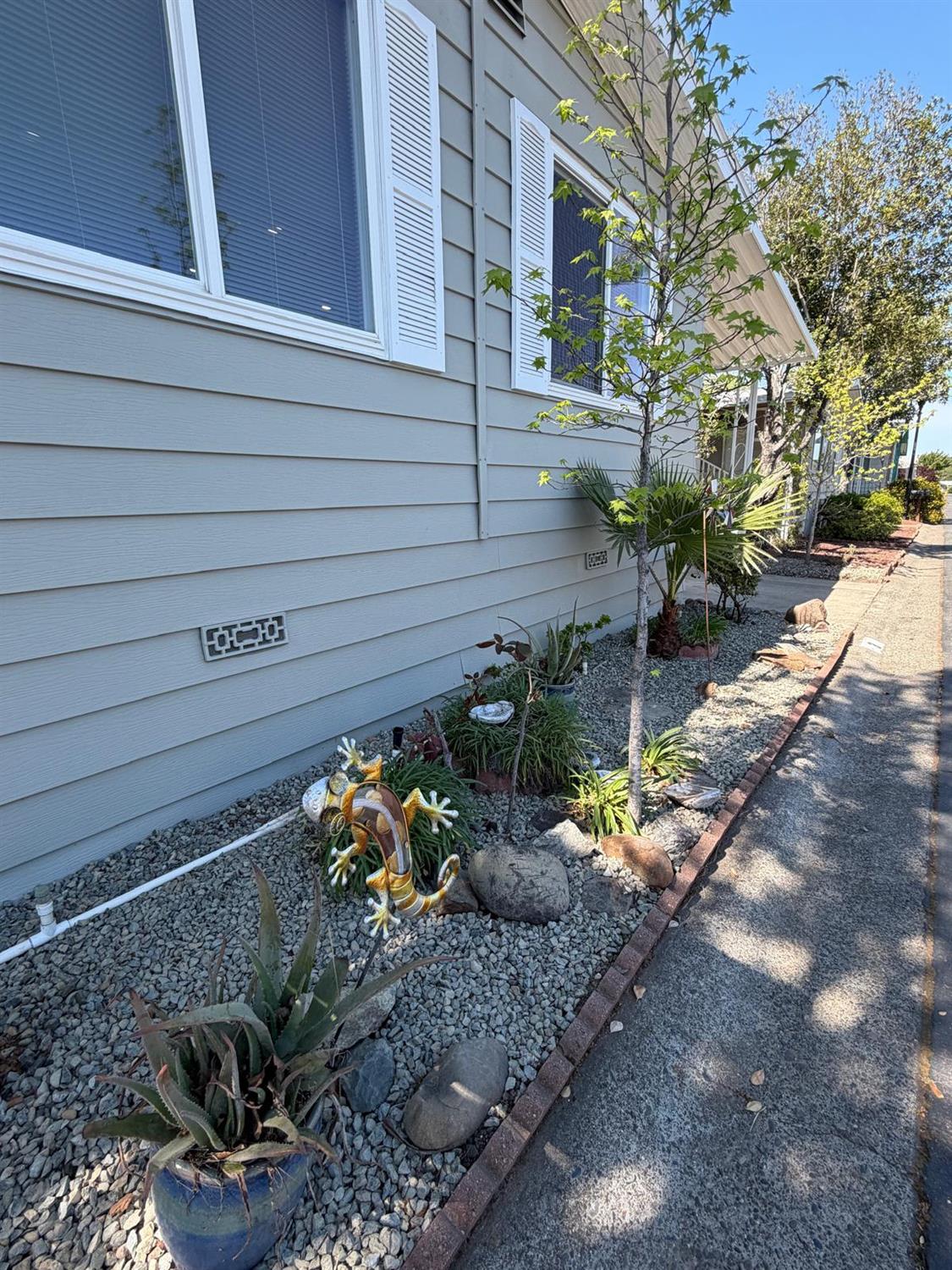 3 Rimma Way Roseville, CA 95661 - Photo 6 of 38 a view of a pathway with a yard