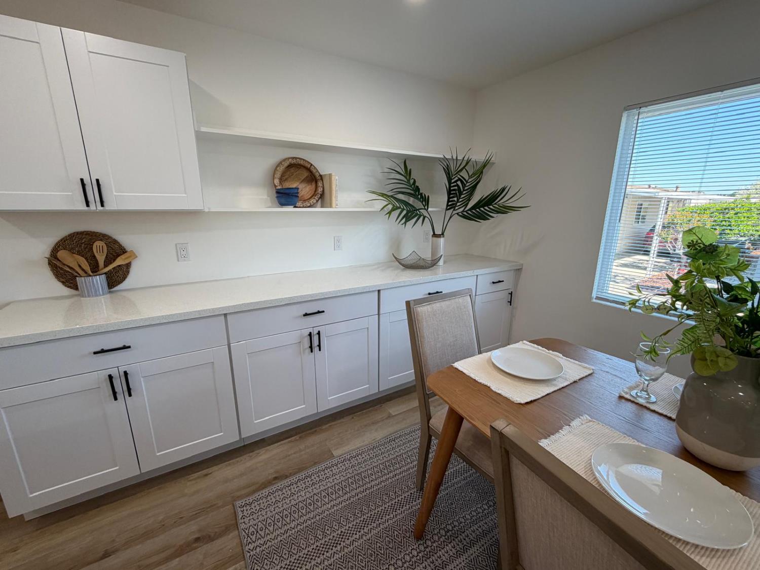 3 Rimma Way Roseville, CA 95661 - Photo 8 of 38 a kitchen with a table and chairs in it