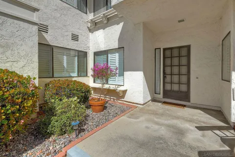 a view of a back yard of the house