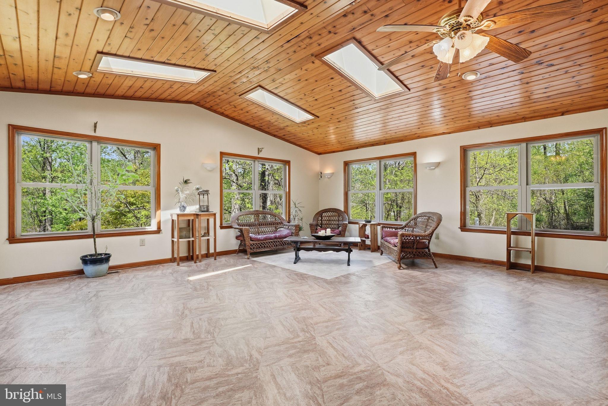 648 Creek Road Front Royal, VA 22630 - Photo 33 of 72 a view of a livingroom with furniture and a large window