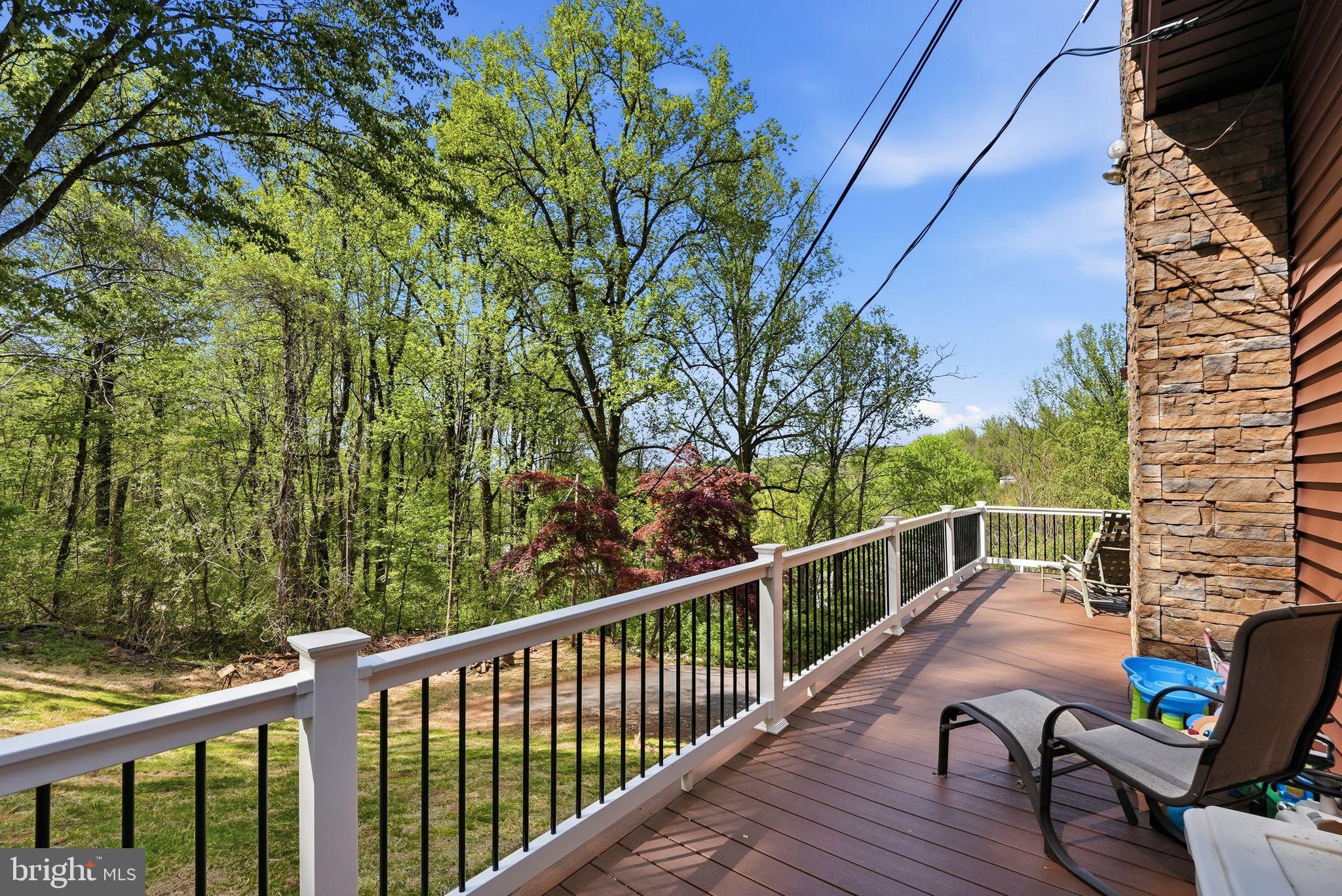 648 Creek Road Front Royal, VA 22630 - Photo 52 of 72 a view of balcony with couch and wooden fence
