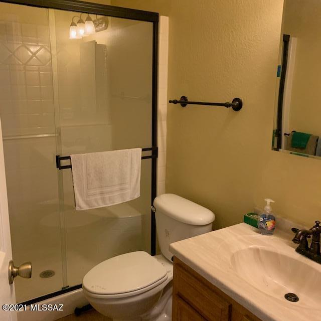 3504 East Howling Wolf Road Willcox, AZ 85643 - Photo 14 of 21 a bathroom with a sink and a toilet