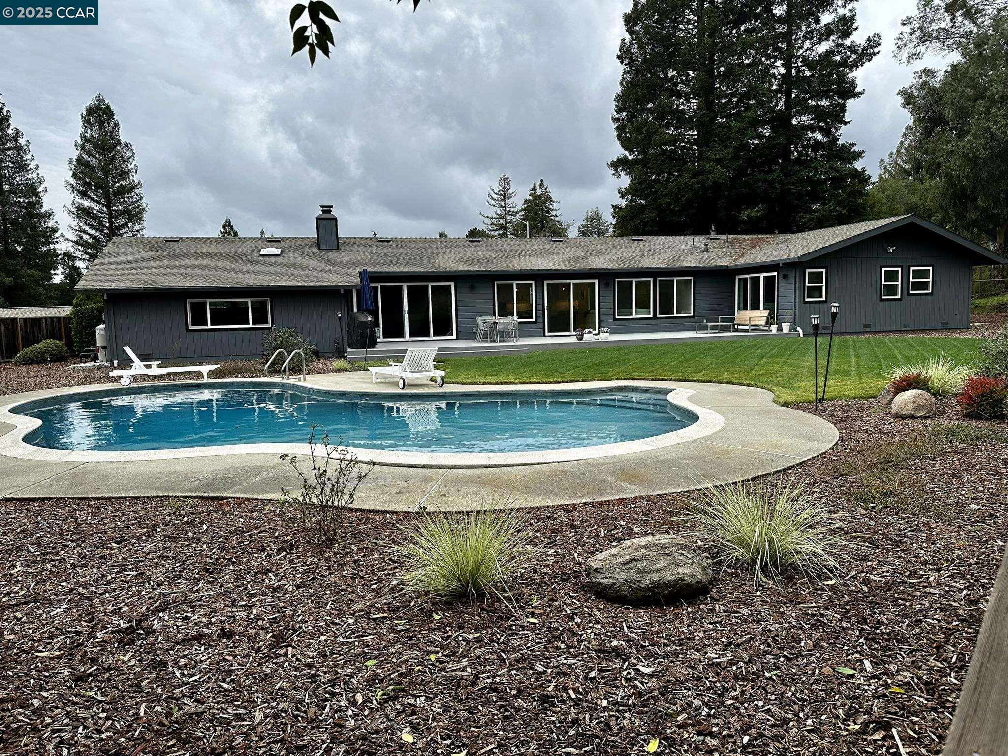 226 Alderbrook Place Moraga, CA 94556 - Photo 24 of 26 a view of a house with a yard
