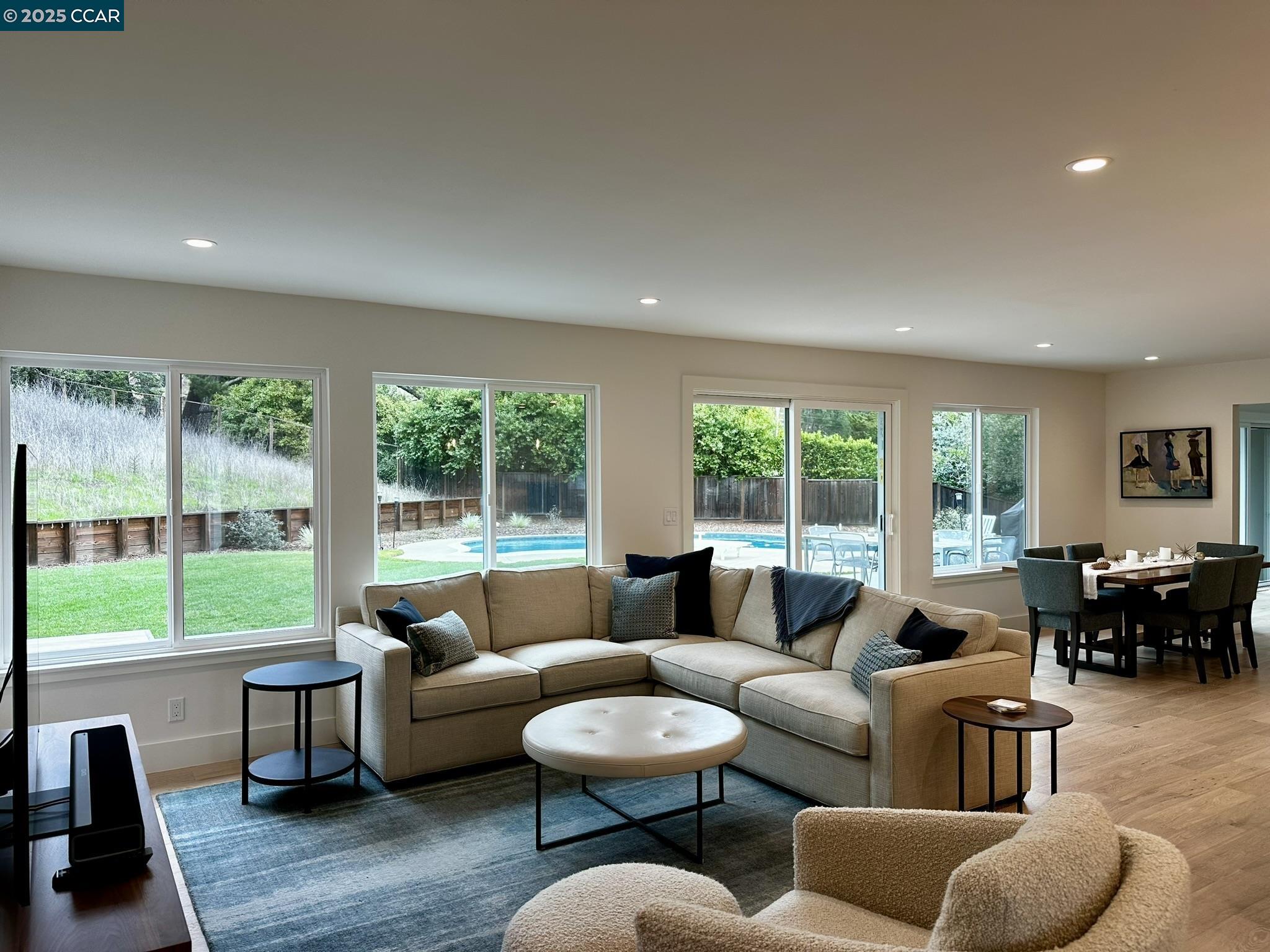 226 Alderbrook Place Moraga, CA 94556 - Photo 10 of 26 a living room with furniture and a large window