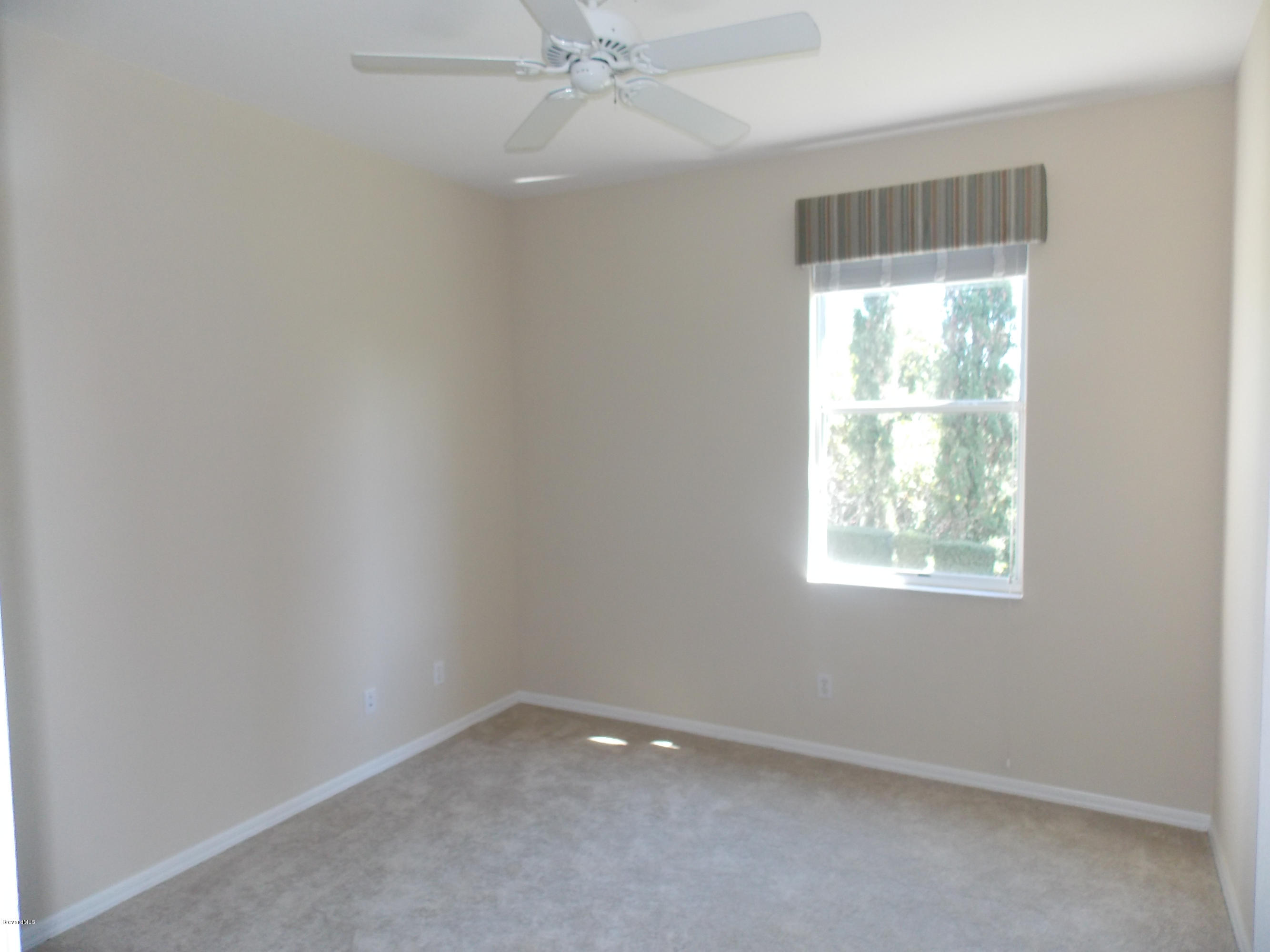 4411 Portage Trail Melbourne, FL 32940 - Photo 8 of 10 Guest bedroom 2