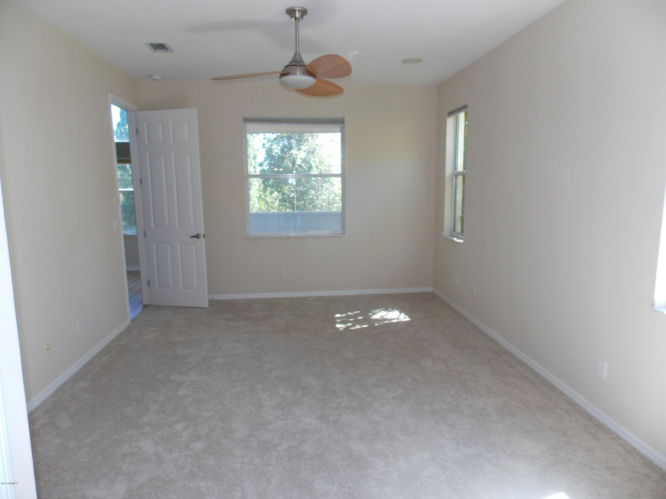 4411 Portage Trail Melbourne, FL 32940 - Photo 9 of 10 Master Bedroom