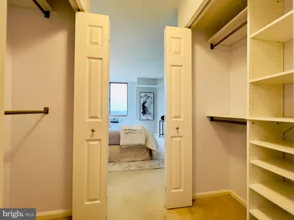 a en suite bathroom with a sink and a mirror