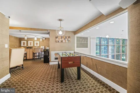 a room with furniture and a window