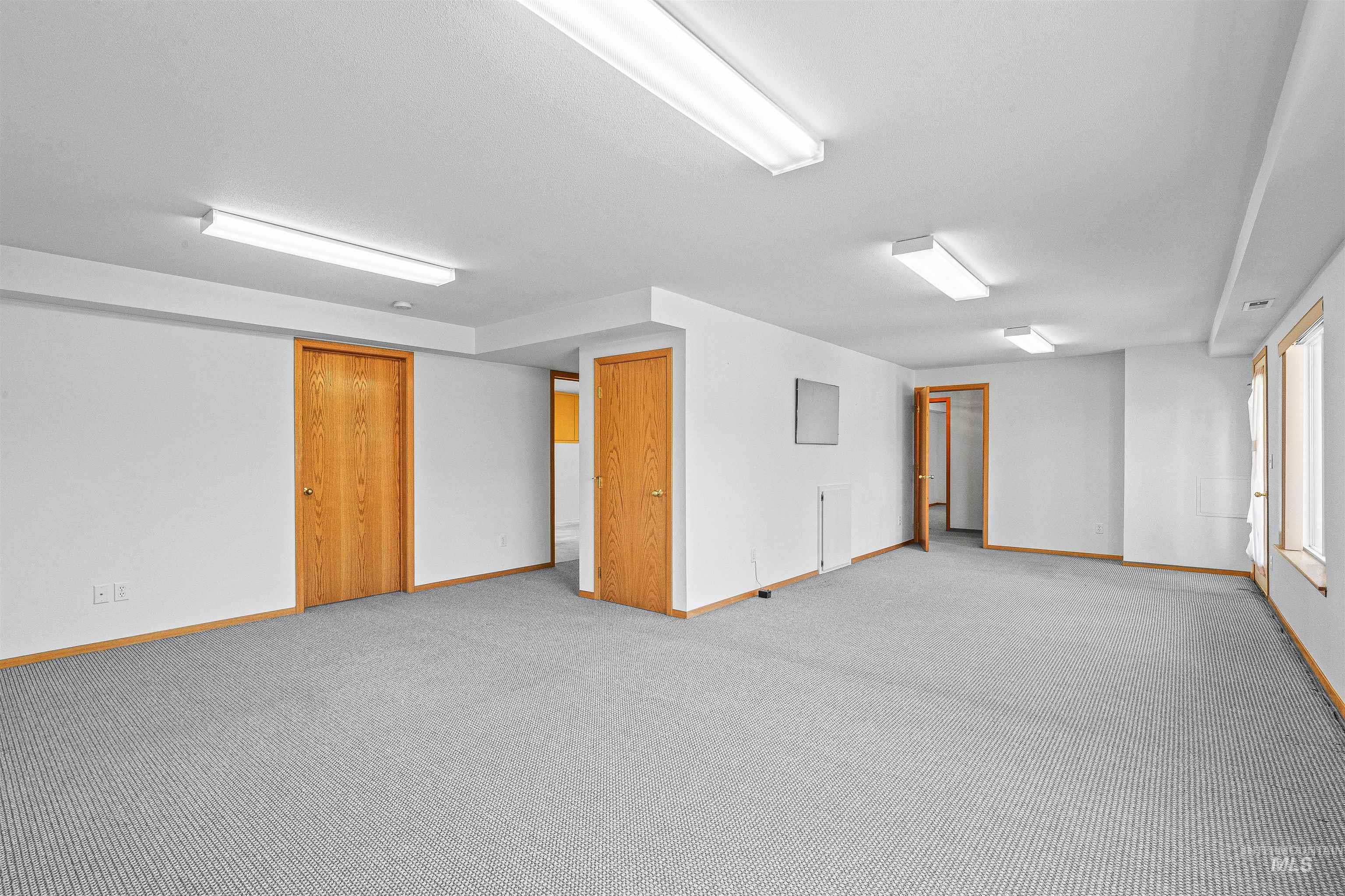 1962 Golfview Drive Clarkston, WA 99403 - Photo 30 of 35 Unfurnished room featuring baseboards and light carpet