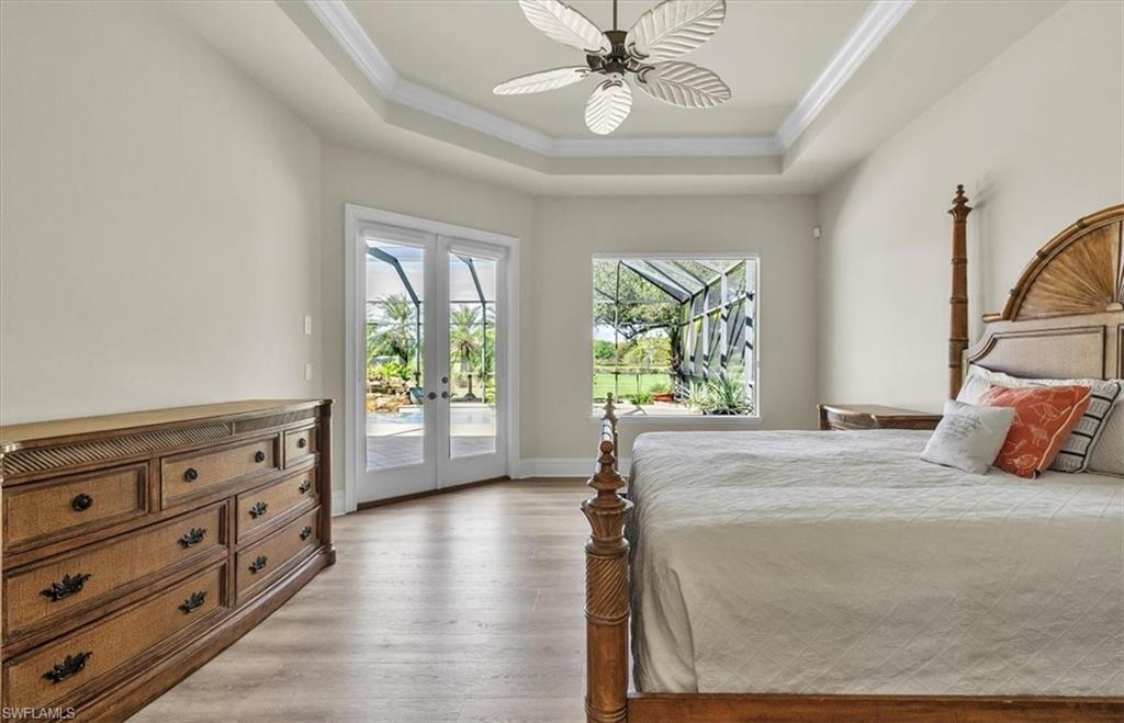 3331 Sanctuary Point Fort Myers, FL 33905 - Photo 26 of 50 a bedroom with a bed and a dresser