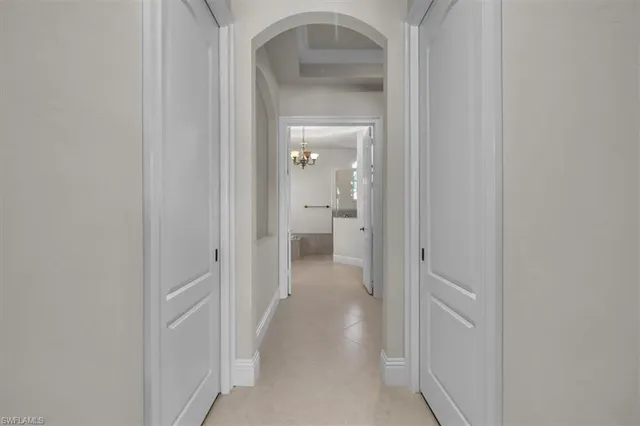 a view of a bathroom from a hallway