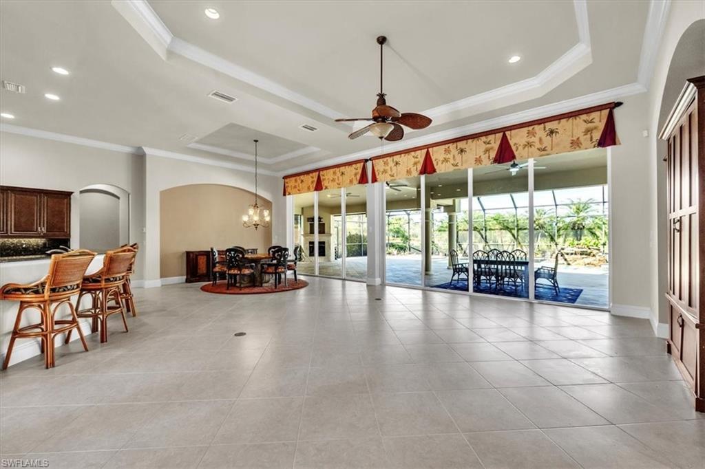 3331 Sanctuary Point Fort Myers, FL 33905 - Photo 9 of 50 a view of a livingroom with furniture water and a floor to ceiling window