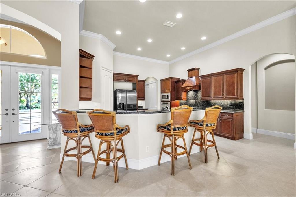 3331 Sanctuary Point Fort Myers, FL 33905 - Photo 10 of 50 a view of a dining room with furniture and windows