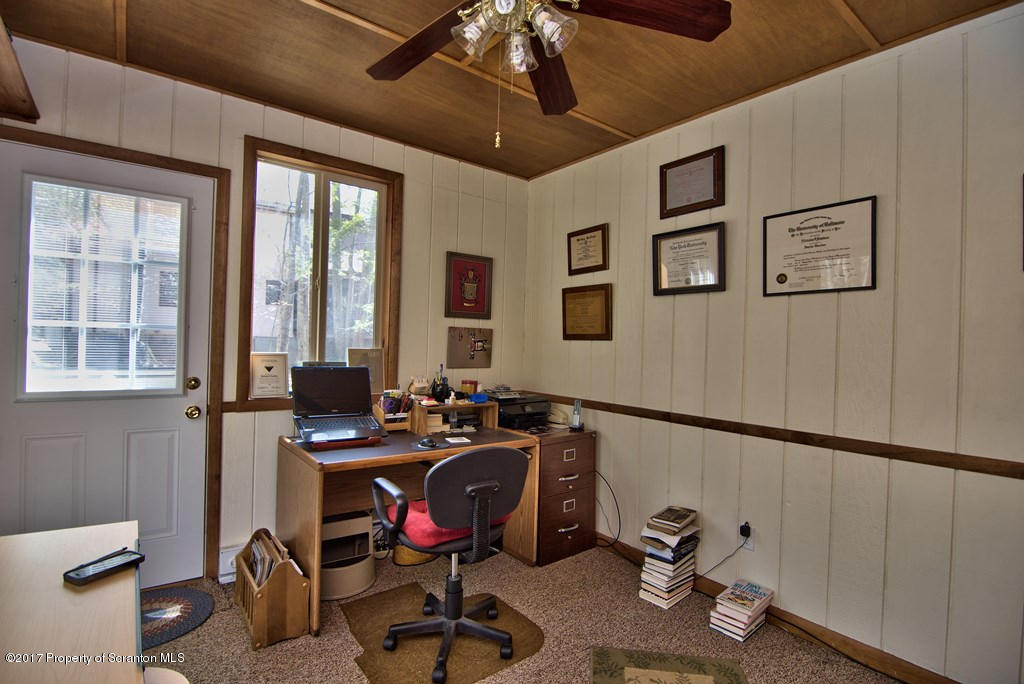 3304 Northgate Road Lake Ariel, PA 18436 - Photo 7 of 26 a view of a workspace with furniture and a window