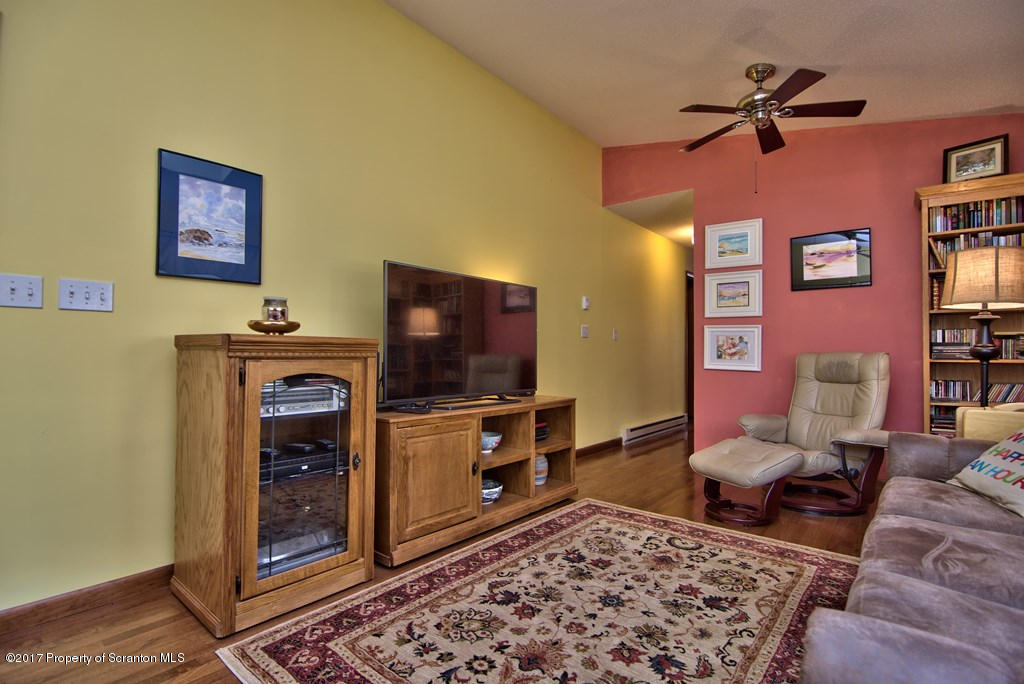 3304 Northgate Road Lake Ariel, PA 18436 - Photo 9 of 26 a living room with furniture and a flat screen tv