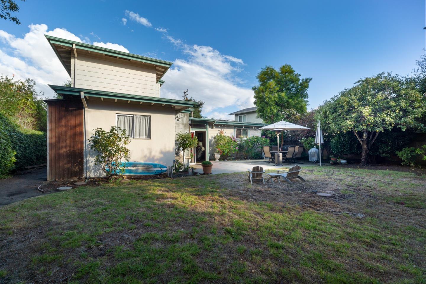 26436 Oliver Road Carmel, CA 93923 - Photo 2 of 25 a view of a backyard with a sitting area