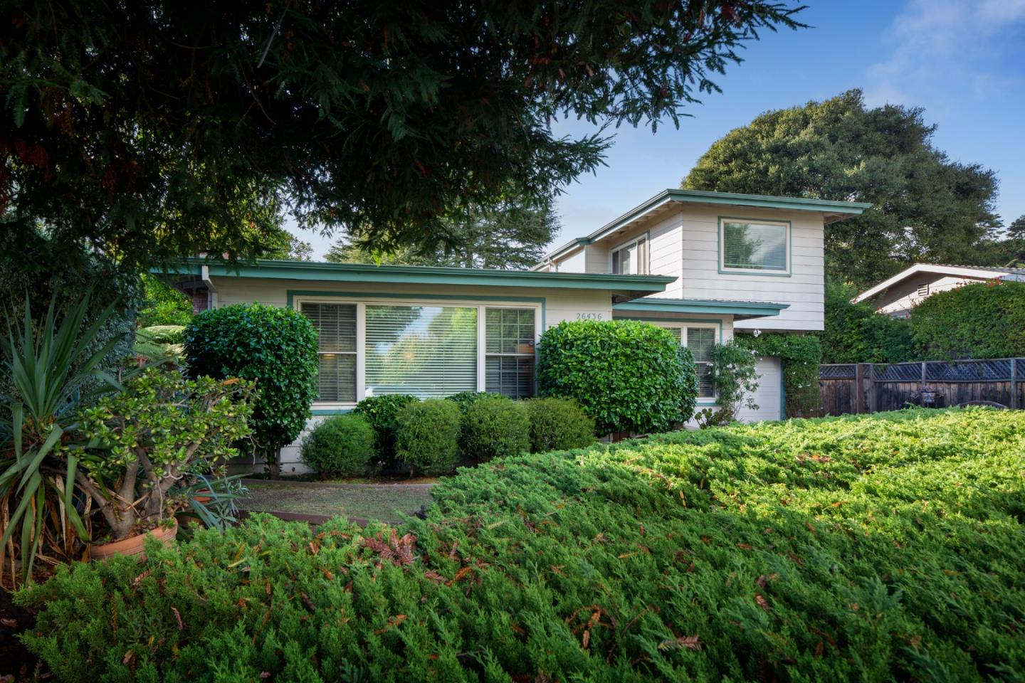 26436 Oliver Road Carmel, CA 93923 - Photo 6 of 25 a front view of a house with a yard