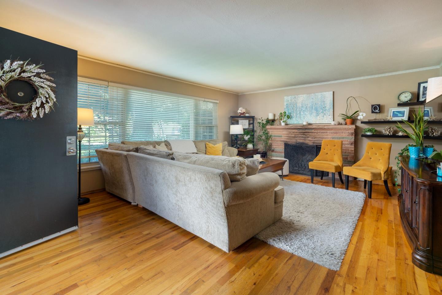 26436 Oliver Road Carmel, CA 93923 - Photo 7 of 25 a living room with furniture and a table