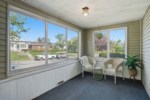 a room with furniture and a window