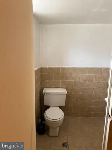 a bathroom with a toilet