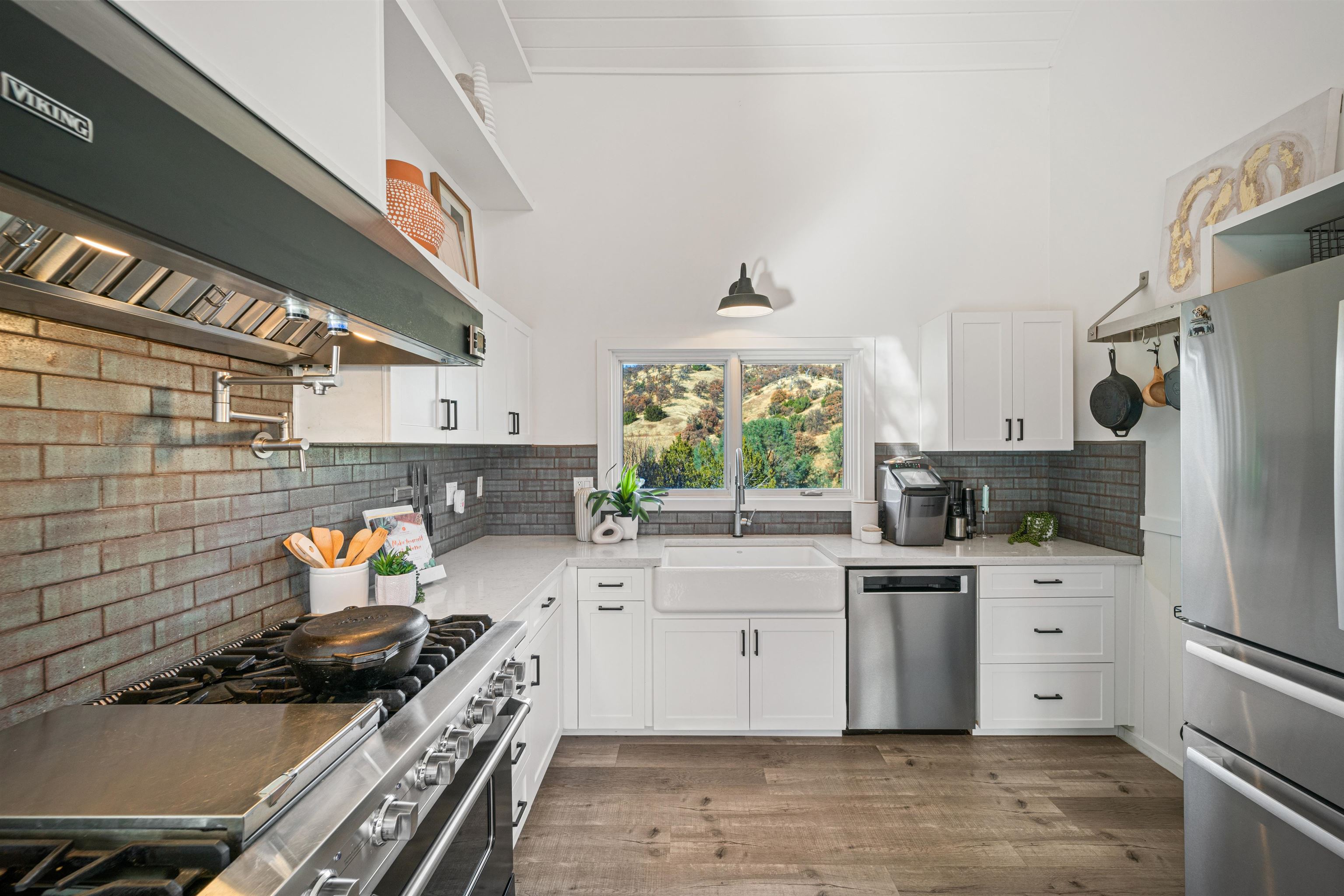 21000 Mines Road Livermore, CA 94550 - Photo 17 of 56 a kitchen with a sink stove and refrigerator