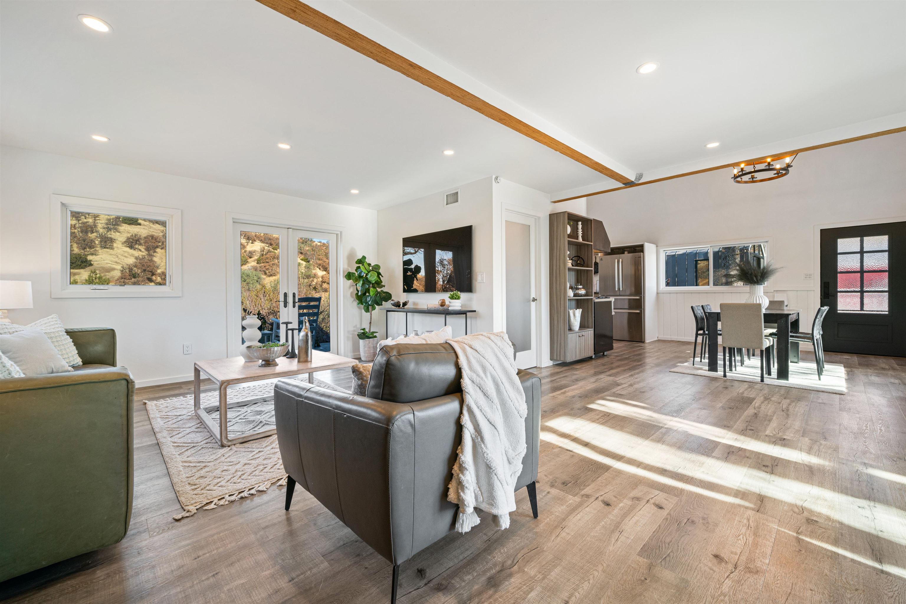 21000 Mines Road Livermore, CA 94550 - Photo 19 of 56 a living room with furniture and a flat screen tv