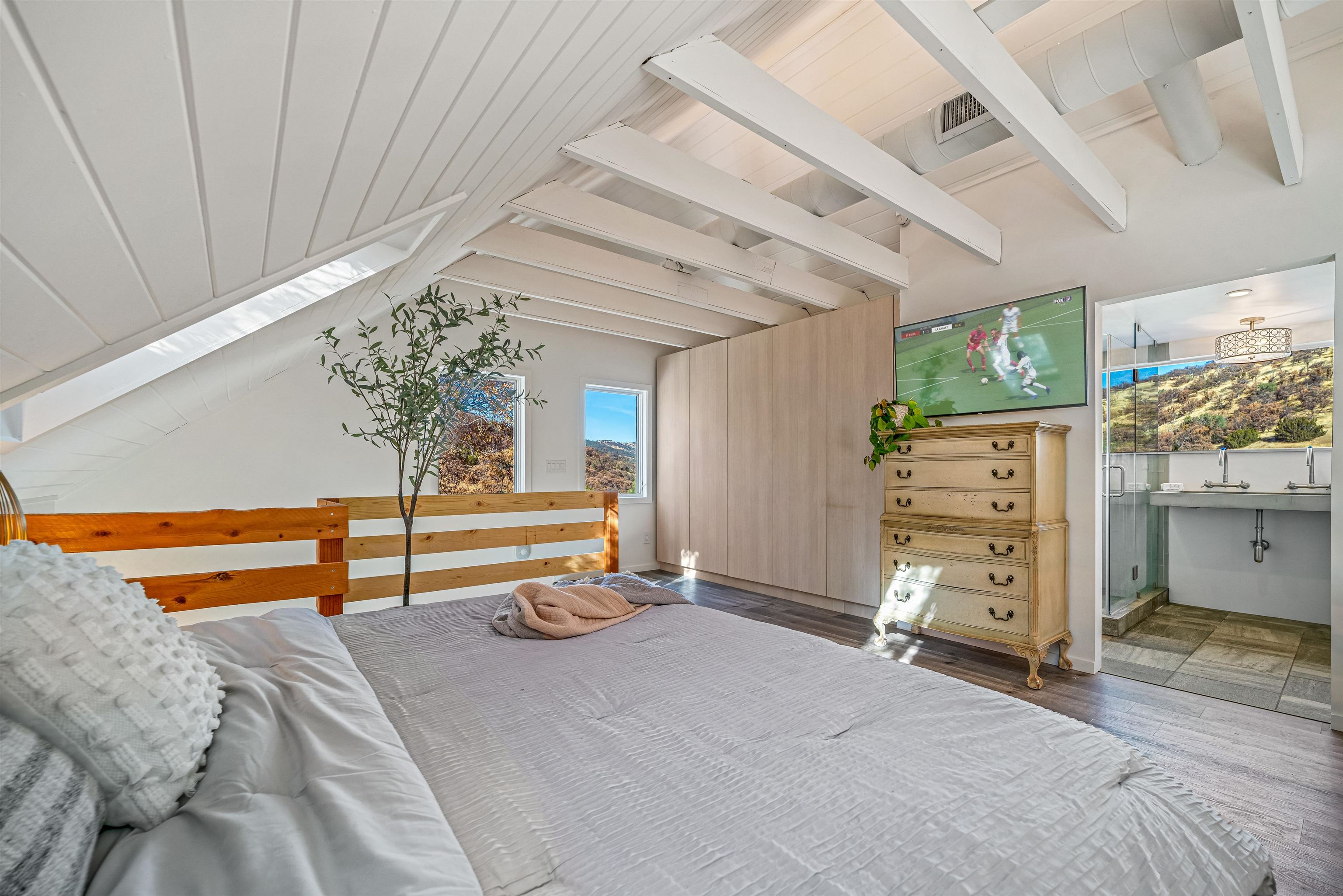 21000 Mines Road Livermore, CA 94550 - Photo 31 of 56 a bedroom with furniture and a chandelier