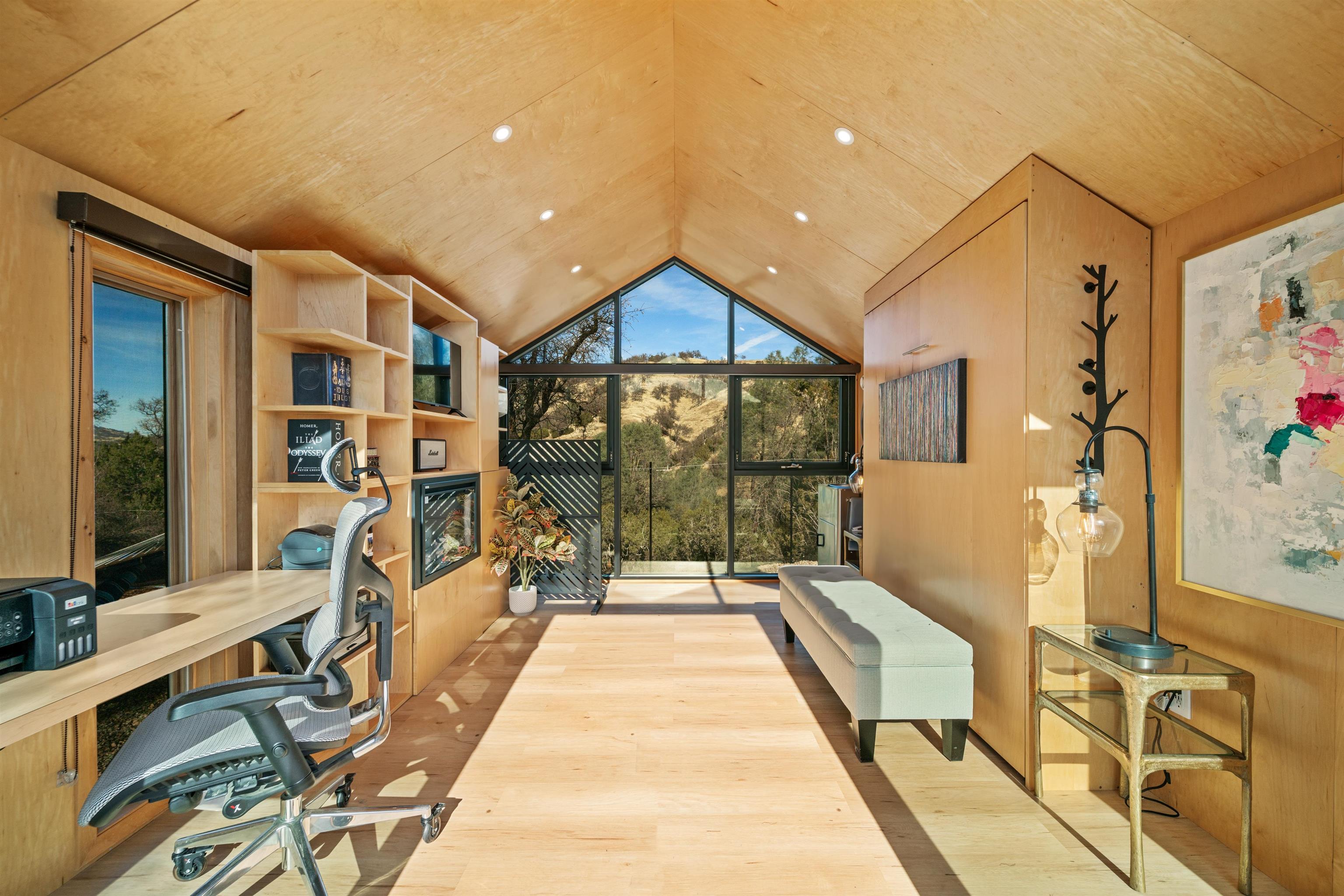 21000 Mines Road Livermore, CA 94550 - Photo 42 of 56 a spacious bedroom with a large bed and a chandelier
