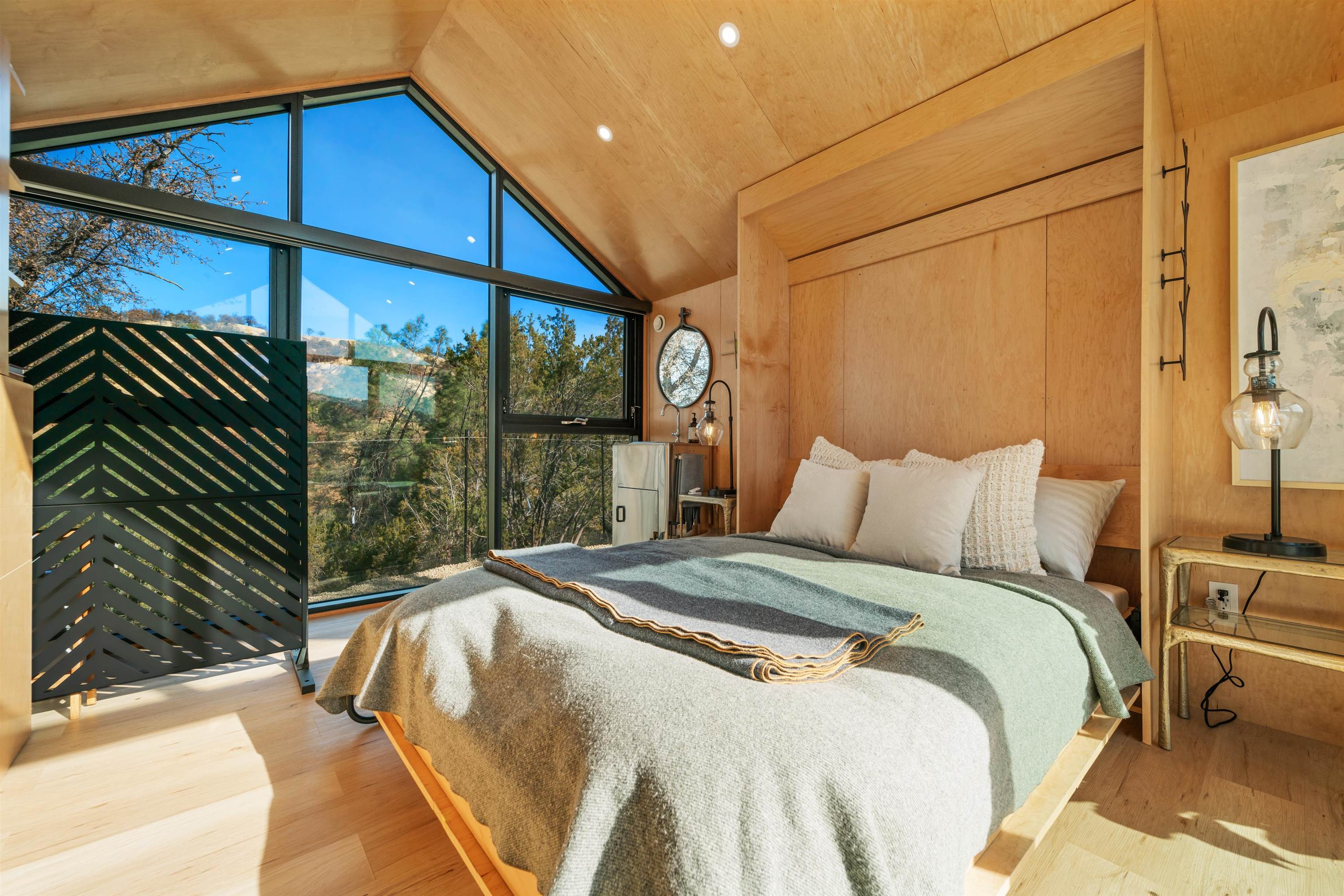 21000 Mines Road Livermore, CA 94550 - Photo 44 of 56 a bed sitting in a bedroom next to a window