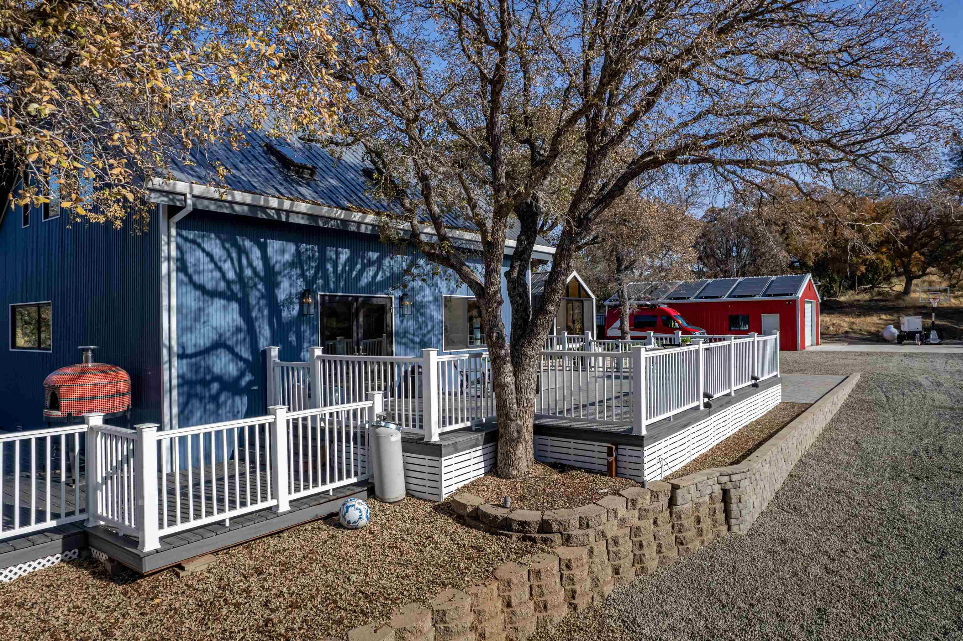 21000 Mines Road Livermore, CA 94550 - Photo 52 of 56 a porch with a bench next to a yard