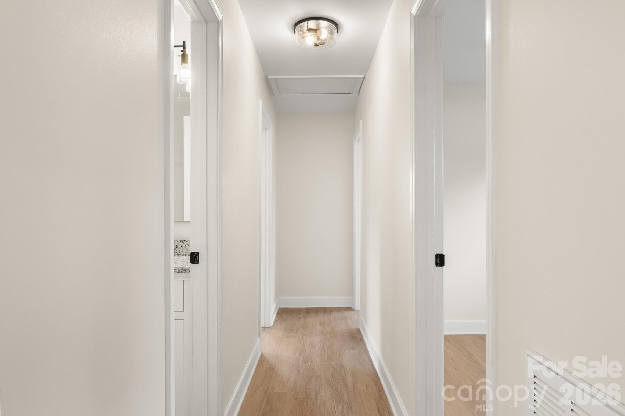 1152 Mt Holly Road Rock Hill, SC 29730 - Photo 23 of 41 a view of a hallway with wooden floor