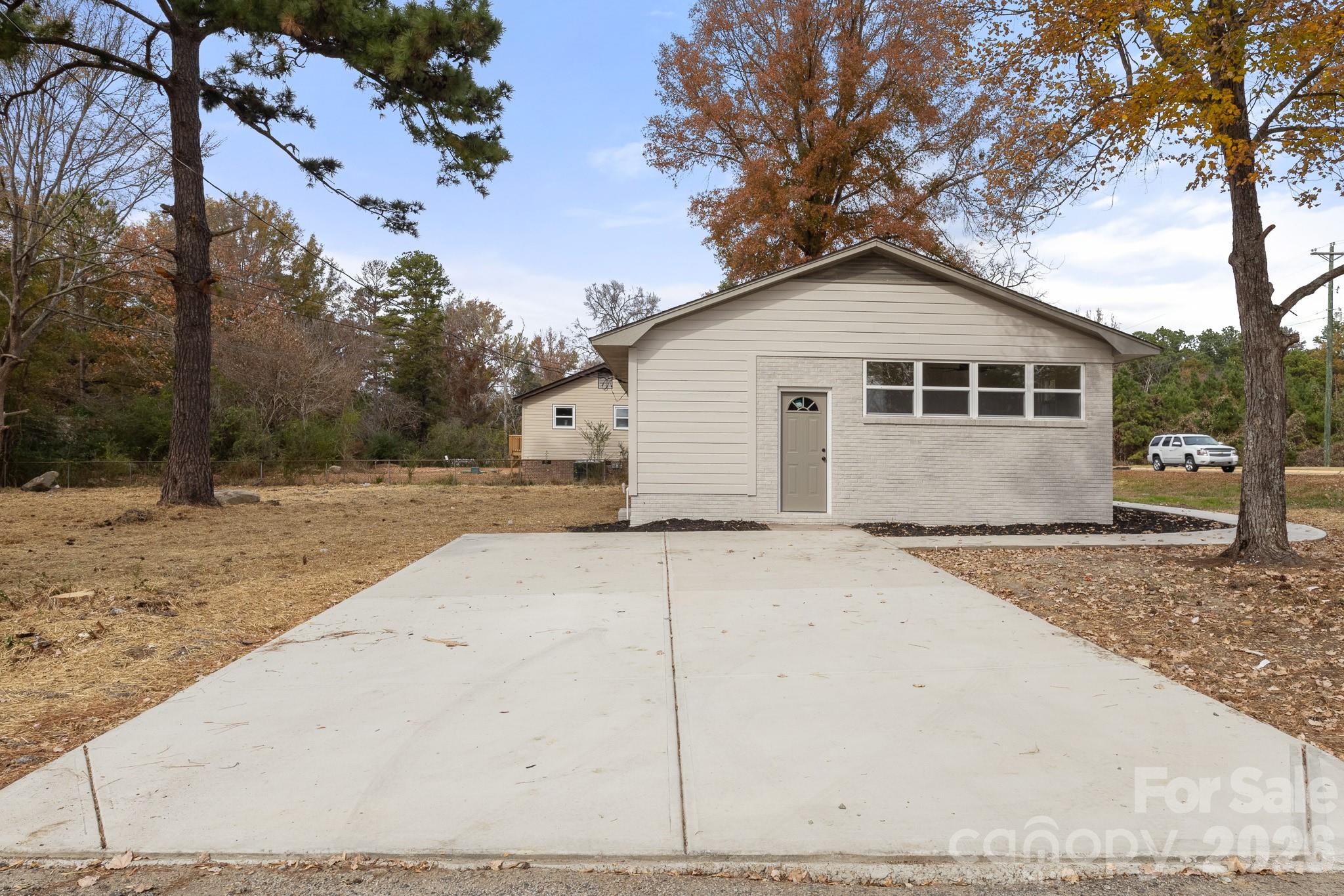 1152 Mt Holly Road Rock Hill, SC 29730 - Photo 38 of 41 a view of house with a yard and garage