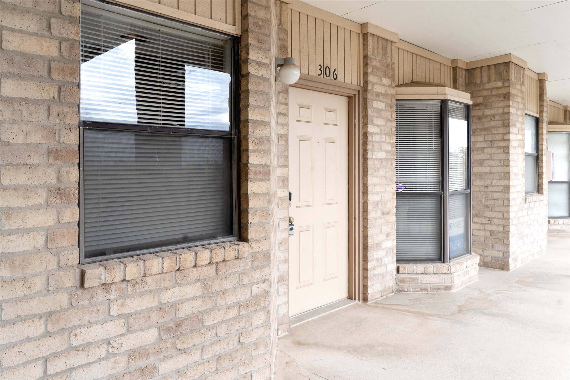 3316 Guadalupe Street, Unit 306 Austin, TX 78705 - Photo 11 of 28 View of exterior entry with covered porch