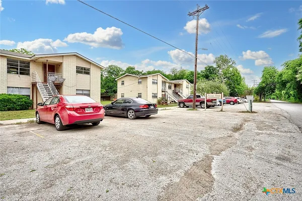 a car parked in front of a house