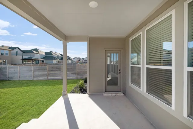 a view of a porch with a backyard