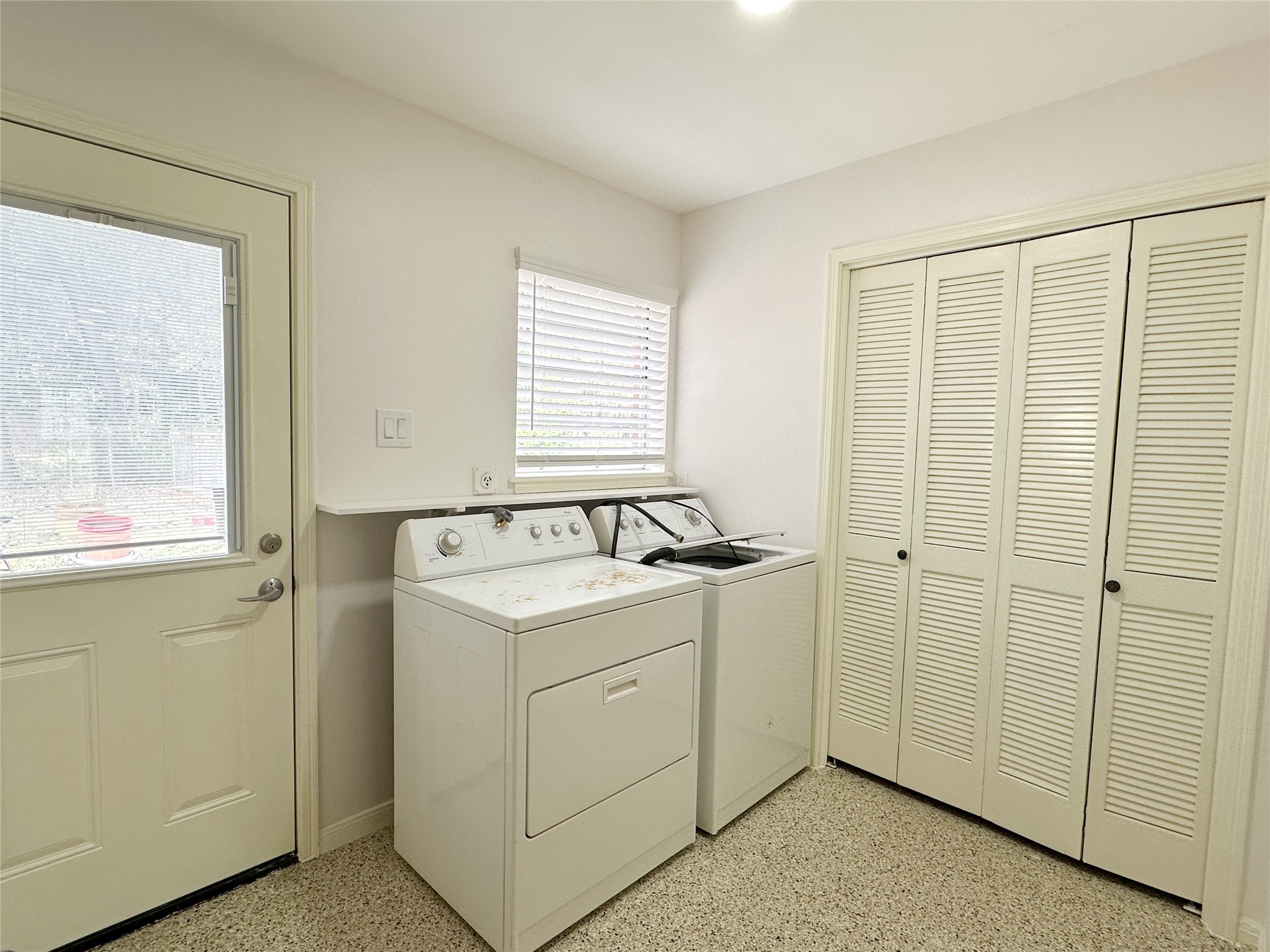 24342 East Webb Road Porter, TX 77365 - Photo 14 of 15 a utility room with a sink dryer and washer