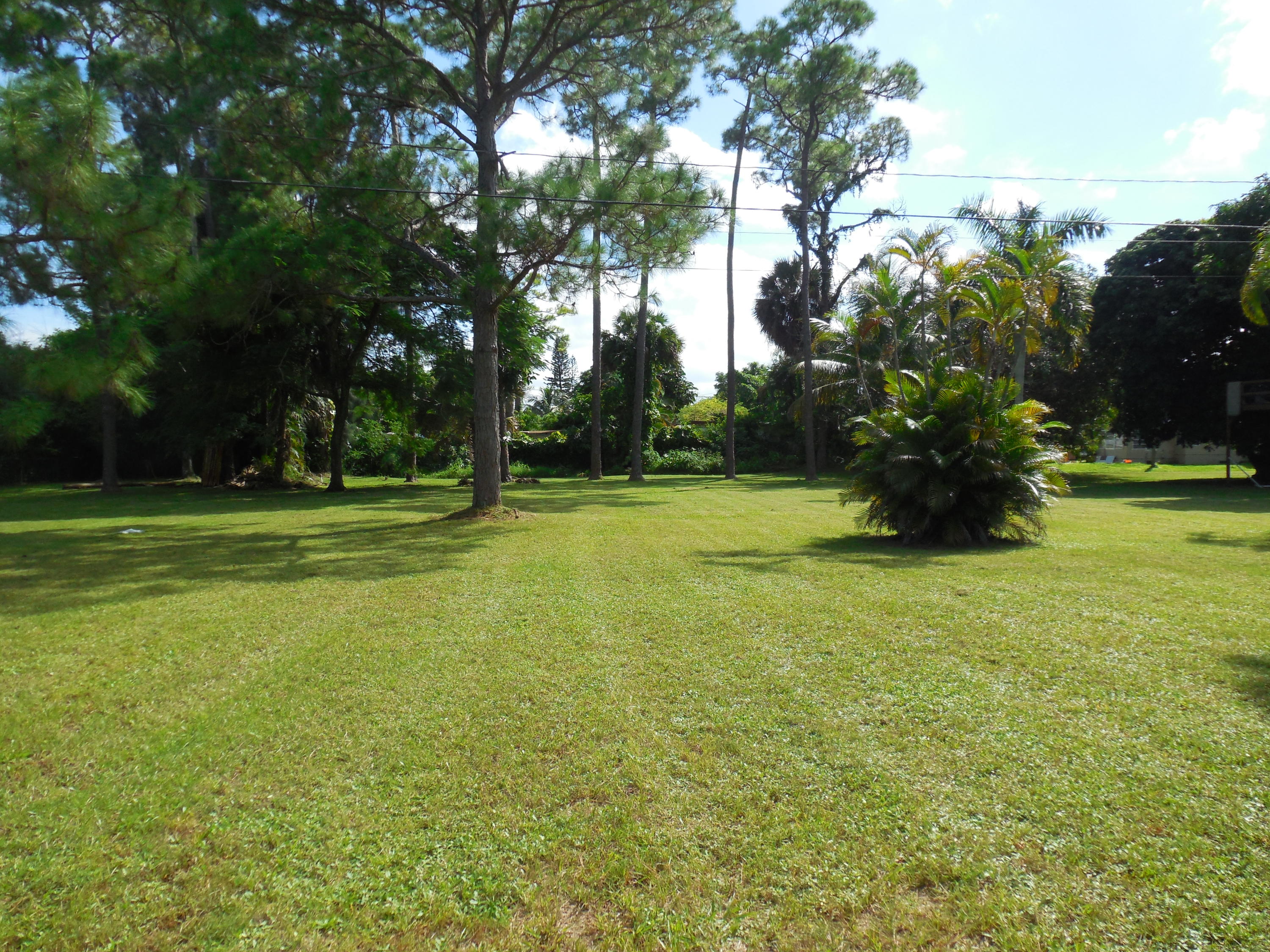 3864 Gulfstream Road Palm Springs, FL 33461 - Photo 9 of 33 3820, 3838, 3864 Backyard view.jpg