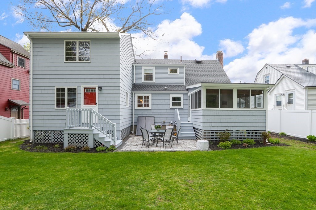 70 Virginia Road Waltham, MA 02453 - Photo 26 of 33 a front view of a house with a garden