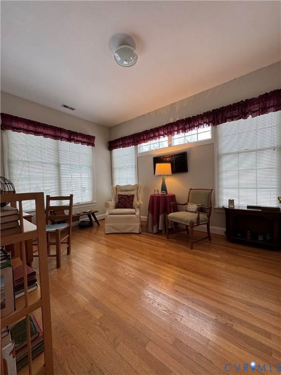 19 Bay Court Kilmarnock, VA 22482 - Photo 22 of 48 a living room with furniture and a flat screen tv