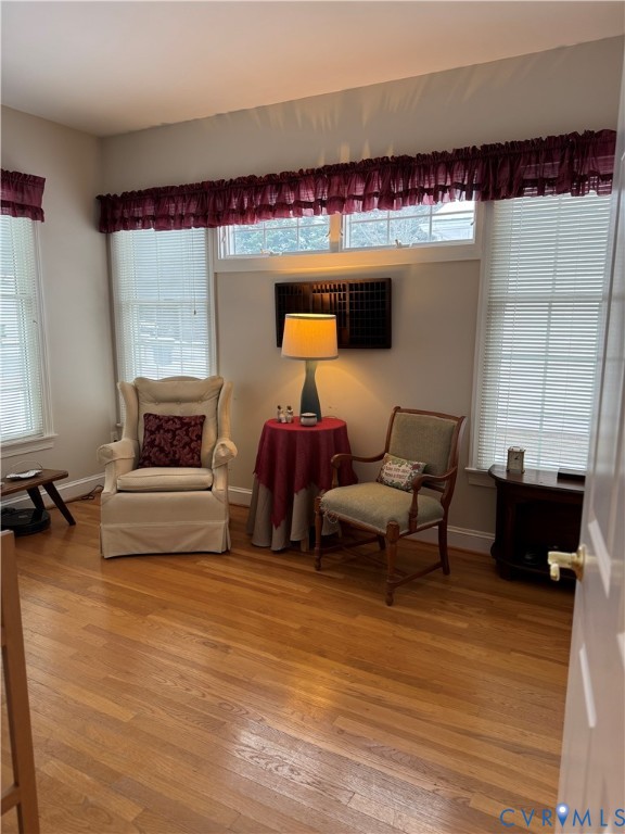 19 Bay Court Kilmarnock, VA 22482 - Photo 24 of 48 a living room with furniture and a fireplace