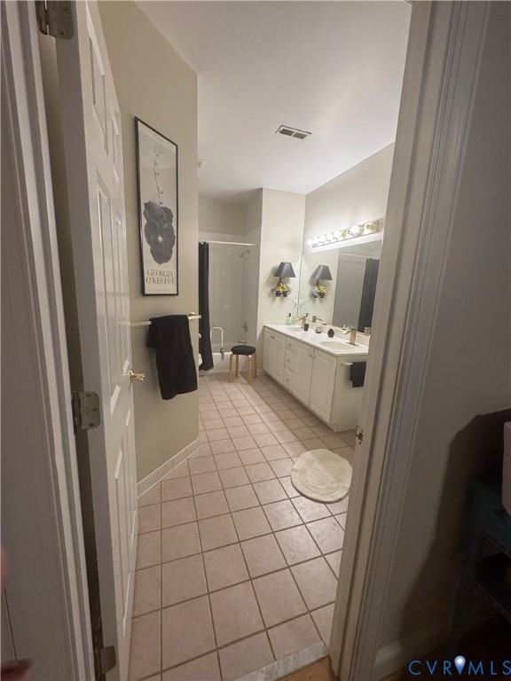 19 Bay Court Kilmarnock, VA 22482 - Photo 32 of 48 a living room with furniture and a flat screen tv