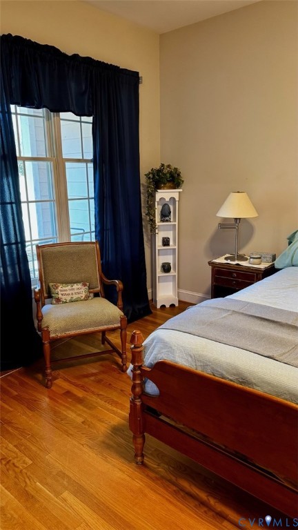 19 Bay Court Kilmarnock, VA 22482 - Photo 34 of 48 a bedroom with a bed and a dresser