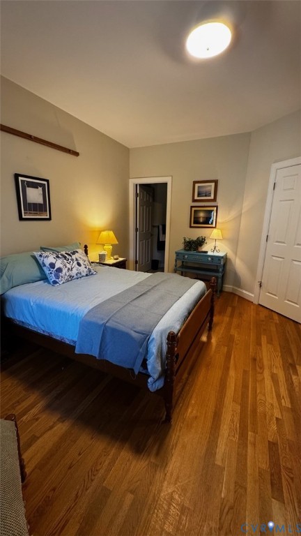 19 Bay Court Kilmarnock, VA 22482 - Photo 38 of 48 a bedroom with a bed and wooden floor