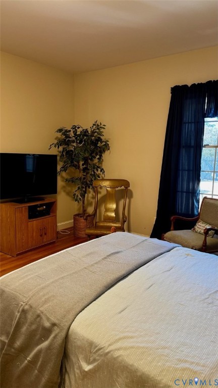 19 Bay Court Kilmarnock, VA 22482 - Photo 42 of 48 a bed sitting in a bedroom and a flat screen tv