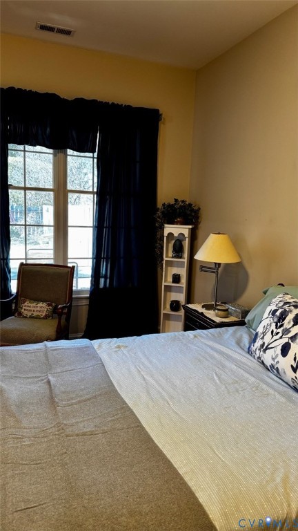 19 Bay Court Kilmarnock, VA 22482 - Photo 43 of 48 a spacious bedroom with a bed and a window