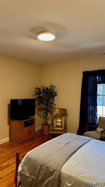 19 Bay Court Kilmarnock, VA 22482 - Photo 44 of 48 a bedroom with a bed and a view of balcony