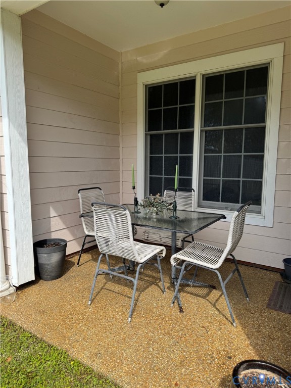 19 Bay Court Kilmarnock, VA 22482 - Photo 47 of 48 a couple of blue chairs sitting in front of a house